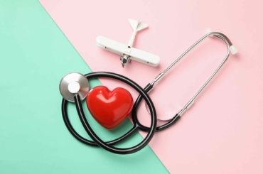 stethoscope-heart-and-plane-on-two-tone-backgroun-2021-08-31-16-02-31-utc